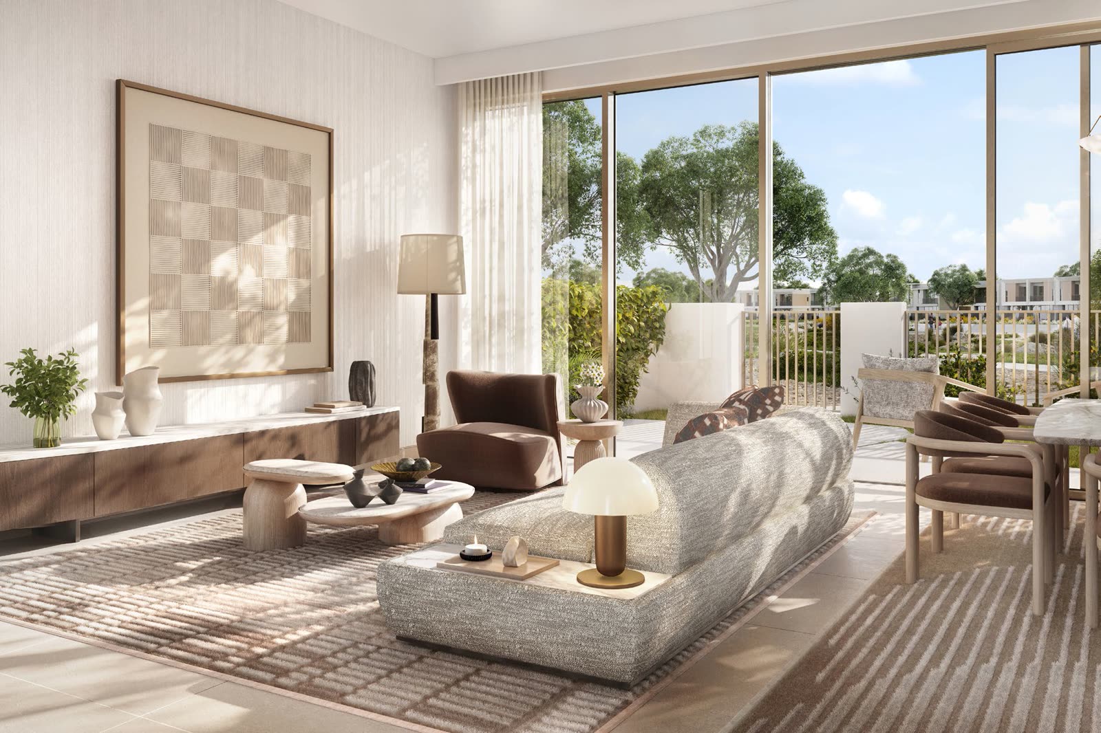 Open-plan living room in neutral tones with full-height glazing to the garden