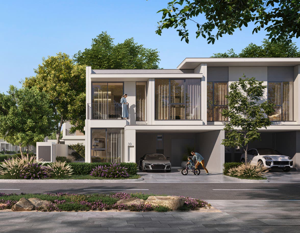 Two-storey townhouse frontage with covered parking and a landscaped garden